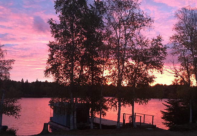 Biscotasing Sportsman Lodge Houseboat At Sunset.jpg